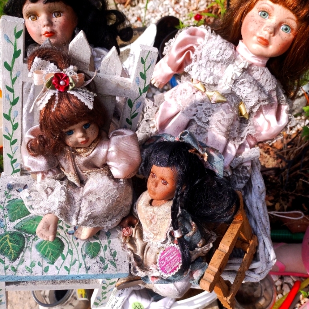 4 Porcelain Dolls